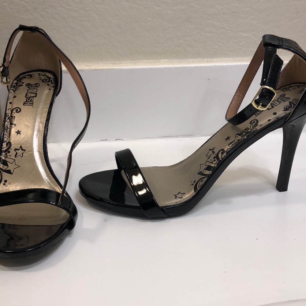 Open Toed single strap heels.